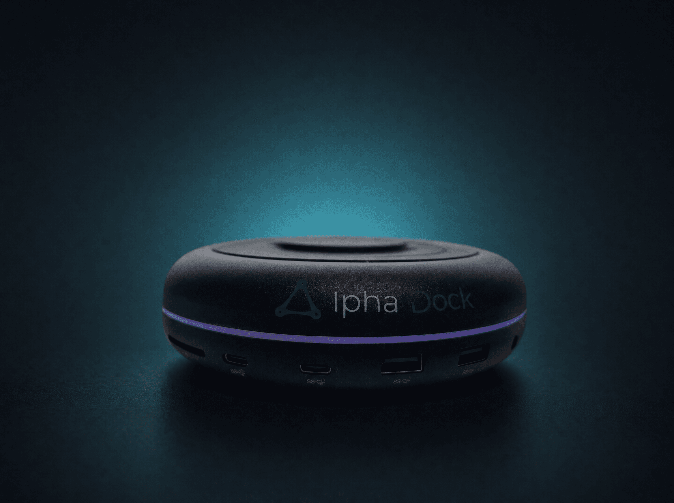AlphaDock CL1 single unit — front view of circular aluminium docking station